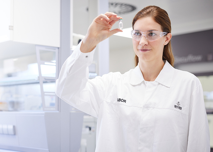 Woman in lab during drug product development phase