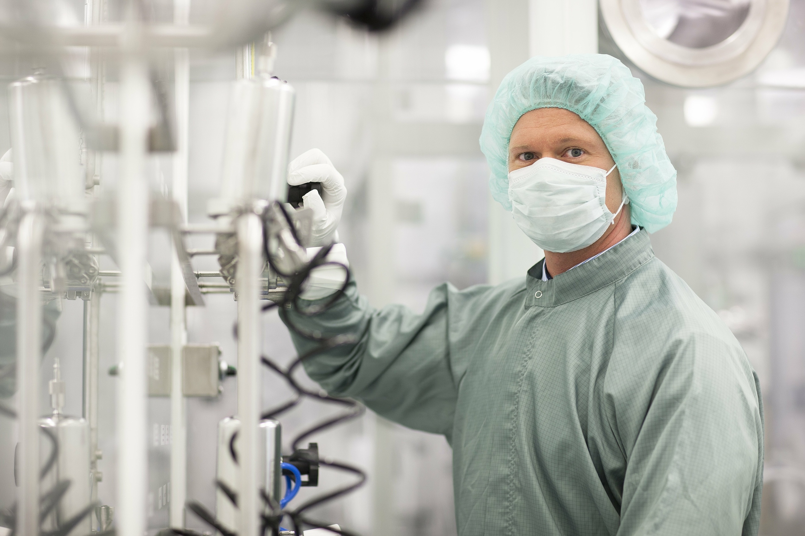 Man in pharmaceutical production during compounding