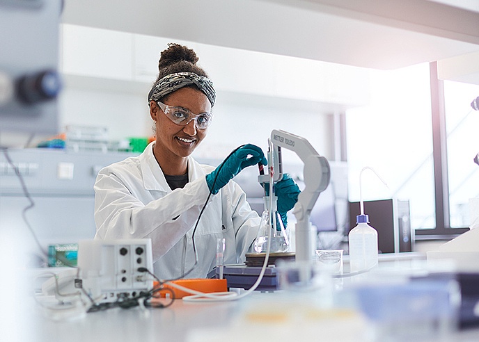 woman in laboratory performing analytical services