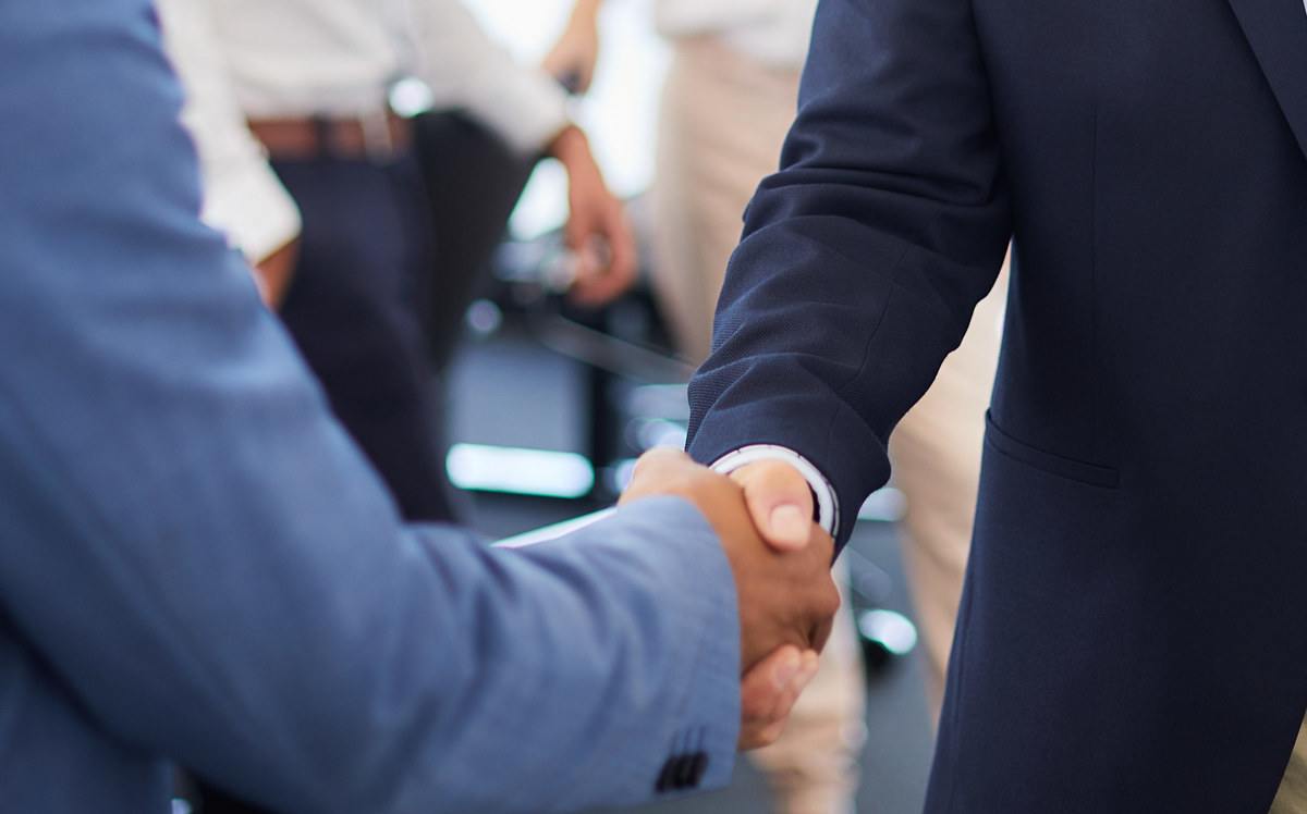 Partnership - Two men shaking hands